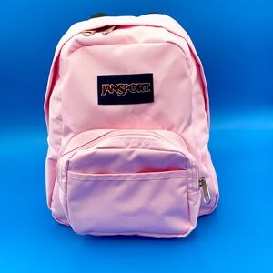 JanSport Half Pint Mini Backpack in Light Pink – Compact & Stylish!